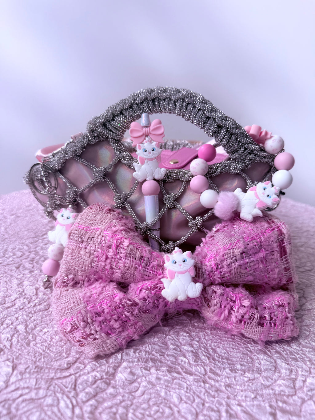 Marie’s Pink Tweed Bow